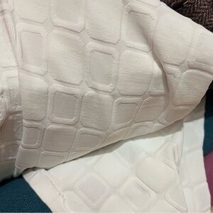 White stretchy fabric bolt